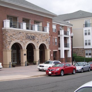 A rental space in The Grove with cars on front